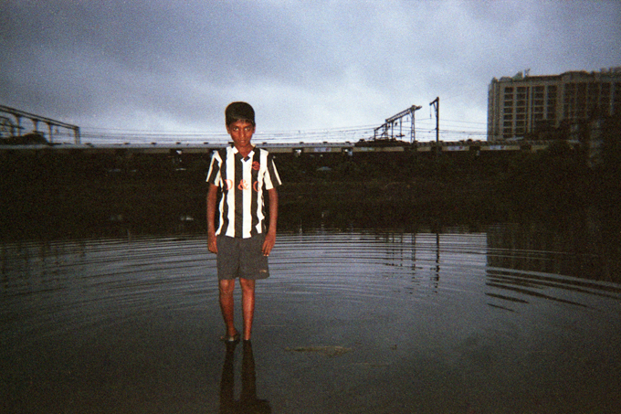 Participant of the No Man's Art Slum Photography Contest, Black Sludge, 2011